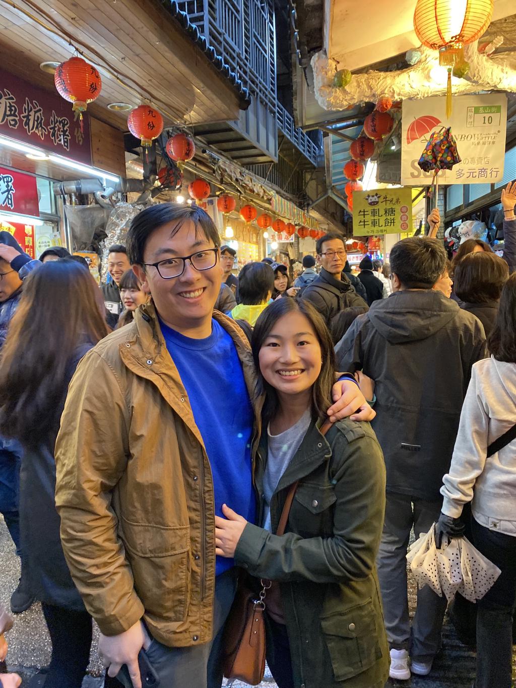 Kelly and Eric in a crowded street in Jiufen, Taiwan